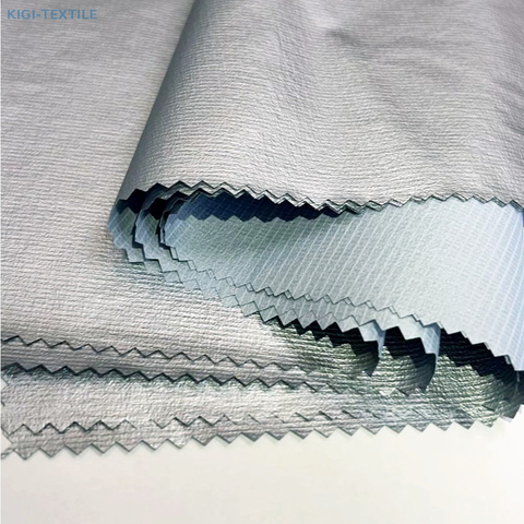 Tissu Ripstop à grille en nylon 15D N66 avec film argenté résistant aux UV pour l'extérieur